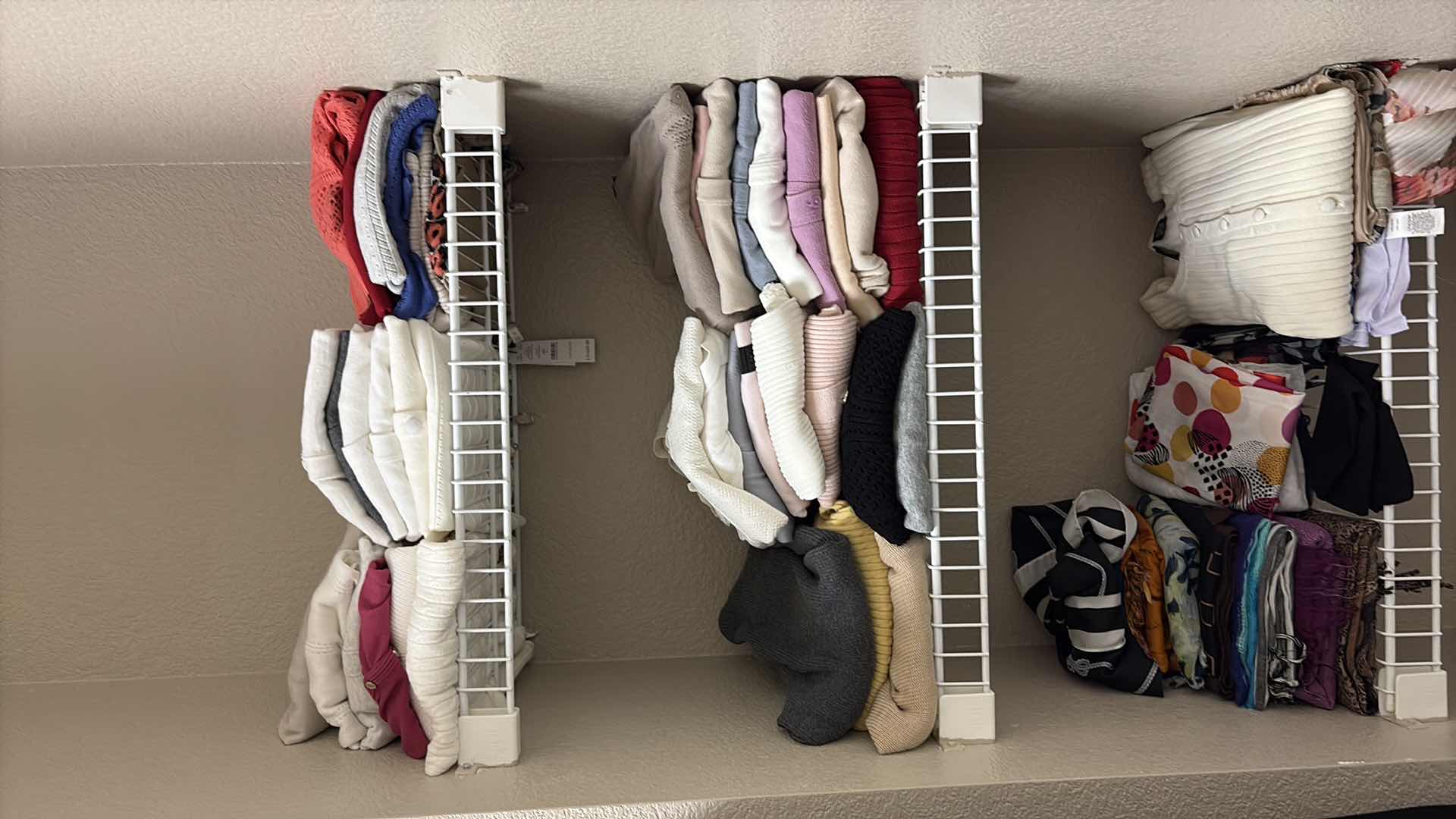 Photo 1 of CONTENTS OF PRIMARY CLOSET WOMENS SWEEATERS & SCARVES SIZE S-XL