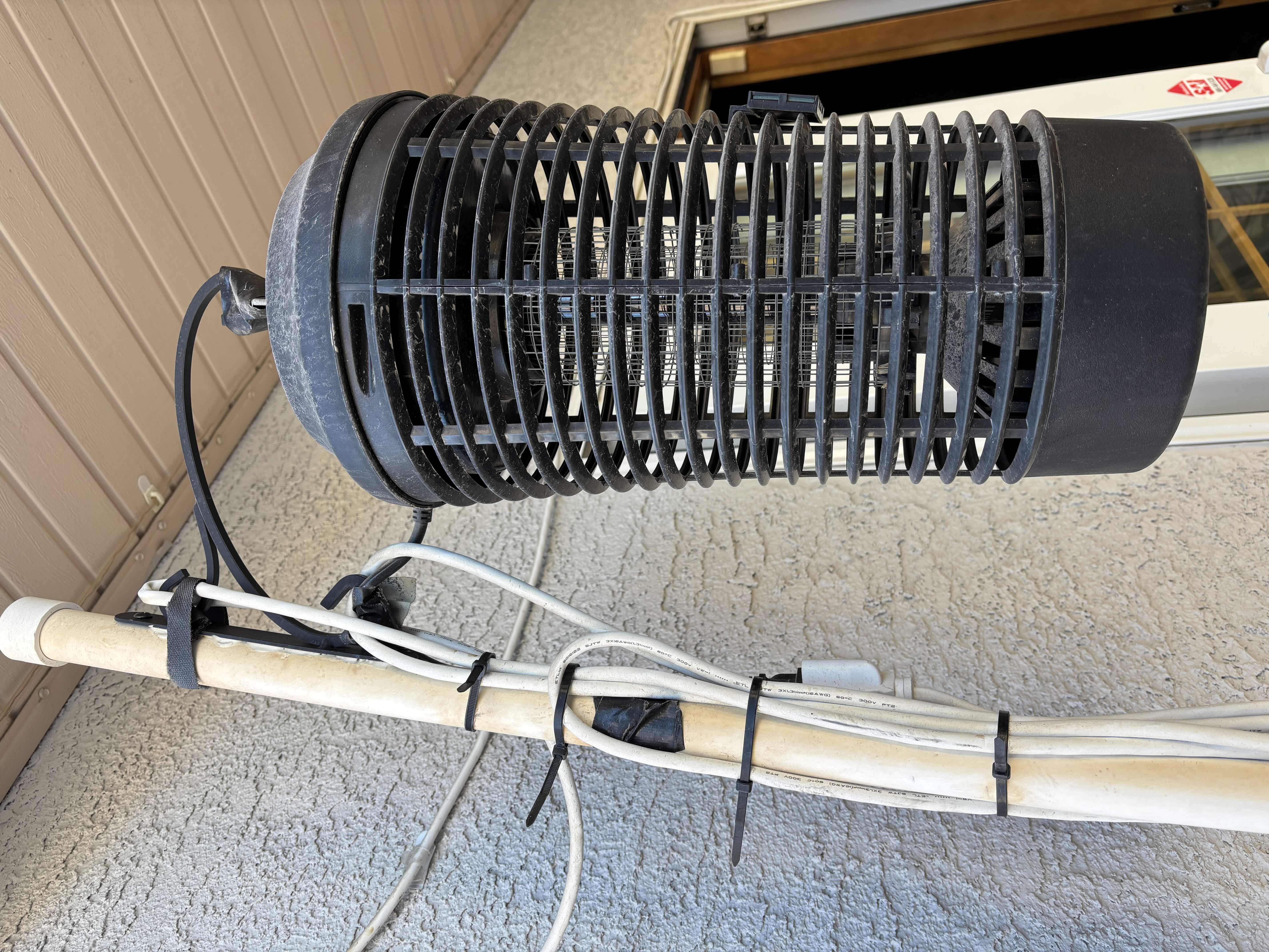 View 3 of BLACK FLAG ELECTRIC OUTDOOR BUG ZAPPER ON MAKESHIFT POLE