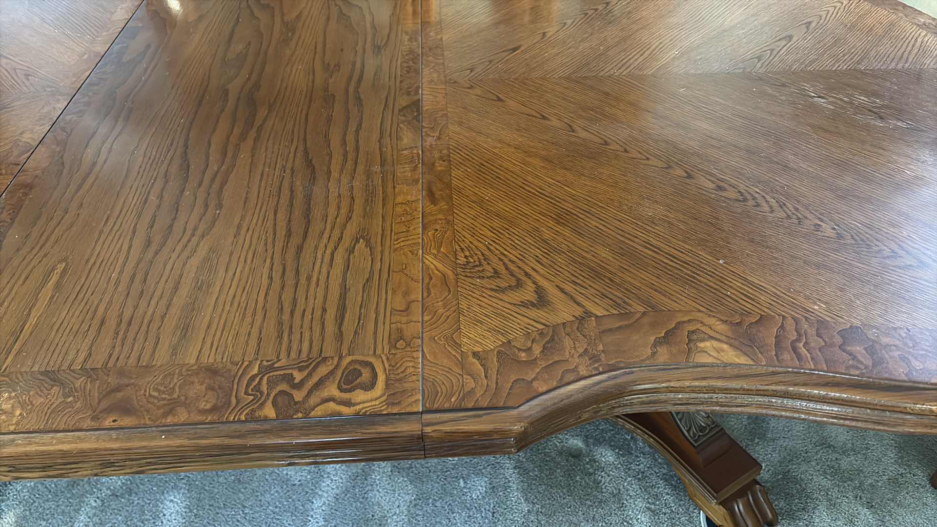 View 3 of TRADITIONAL WOOD EXTENDABLE DINING TABLE WITH ORNATE PEDESTAL BASE – MEDIUM BROWN COMES W/TWO EXTENSION LEAVES AND FELT COVERS 84”X62”H29.5”