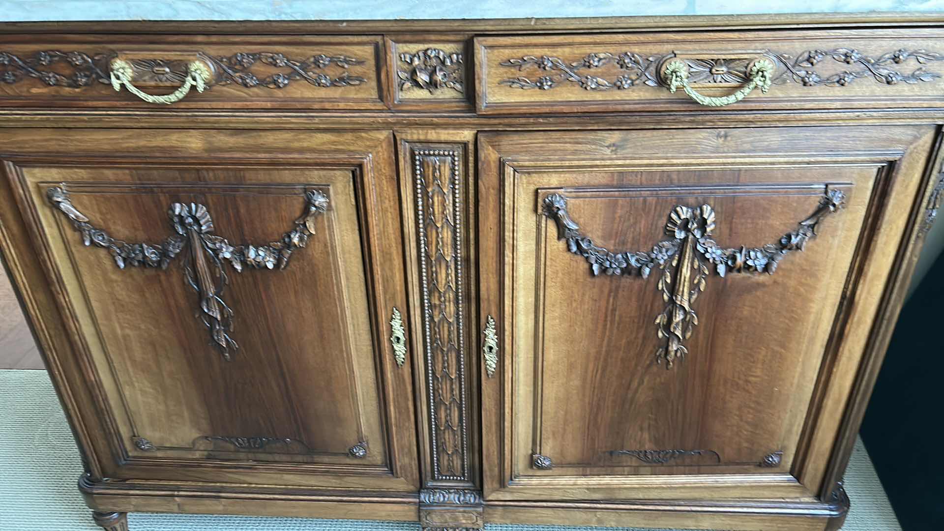 Photo 1 of ANTIQUE FRENCH WALNUT HUTCH W INTRICATE FLORAL CARVINGS & WHITE MARBLE TOP CURVED BEVELED GLASS DISPLAY 59" X 22" H 42" GLASSWARE NOT INCLUDED (SEE NOTES)