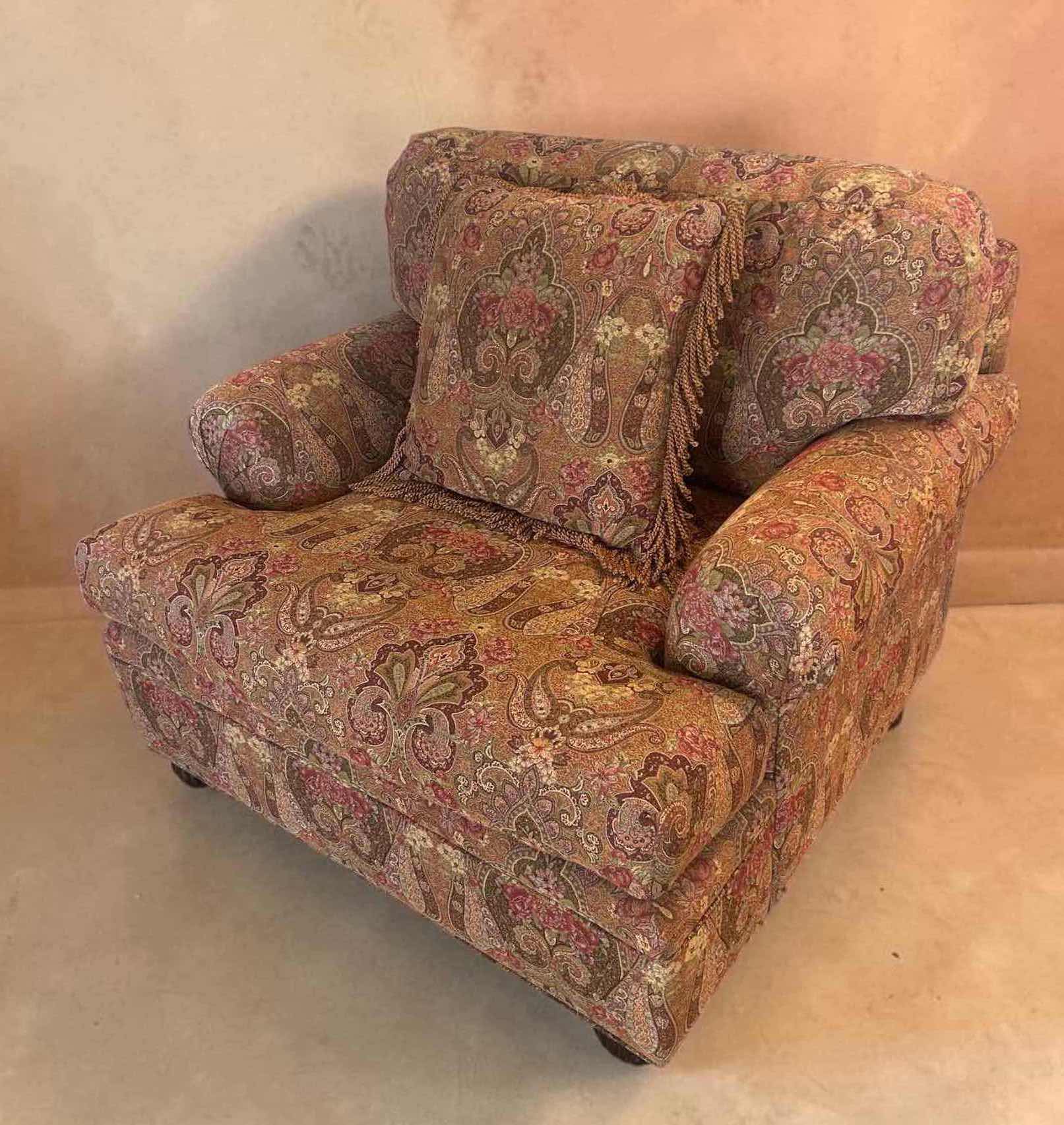 Photo 1 of ETHAN ALLEN ARMCHAIR W PLUSH OVERSIZED MULTI COLORED PAISLEY FABRIC W MATCHING DECORATIVE FRINGE PILLOWS 42" X 39" H 32" SEE NOTES