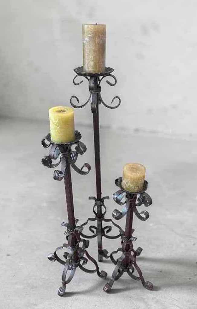 Photo 1 of SET OF WROUGHT IRON FLOOR CANDLE HOLDERS W ORNATE SCROLLWORK H 40" 30" 24"