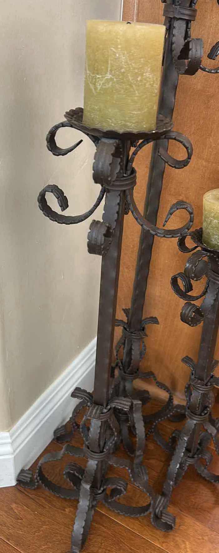 Photo 1 of SET OF WROUGHT IRON FLOOR CANDLE HOLDERS W ORNATE SCROLLWORK H 40" 30" 24"