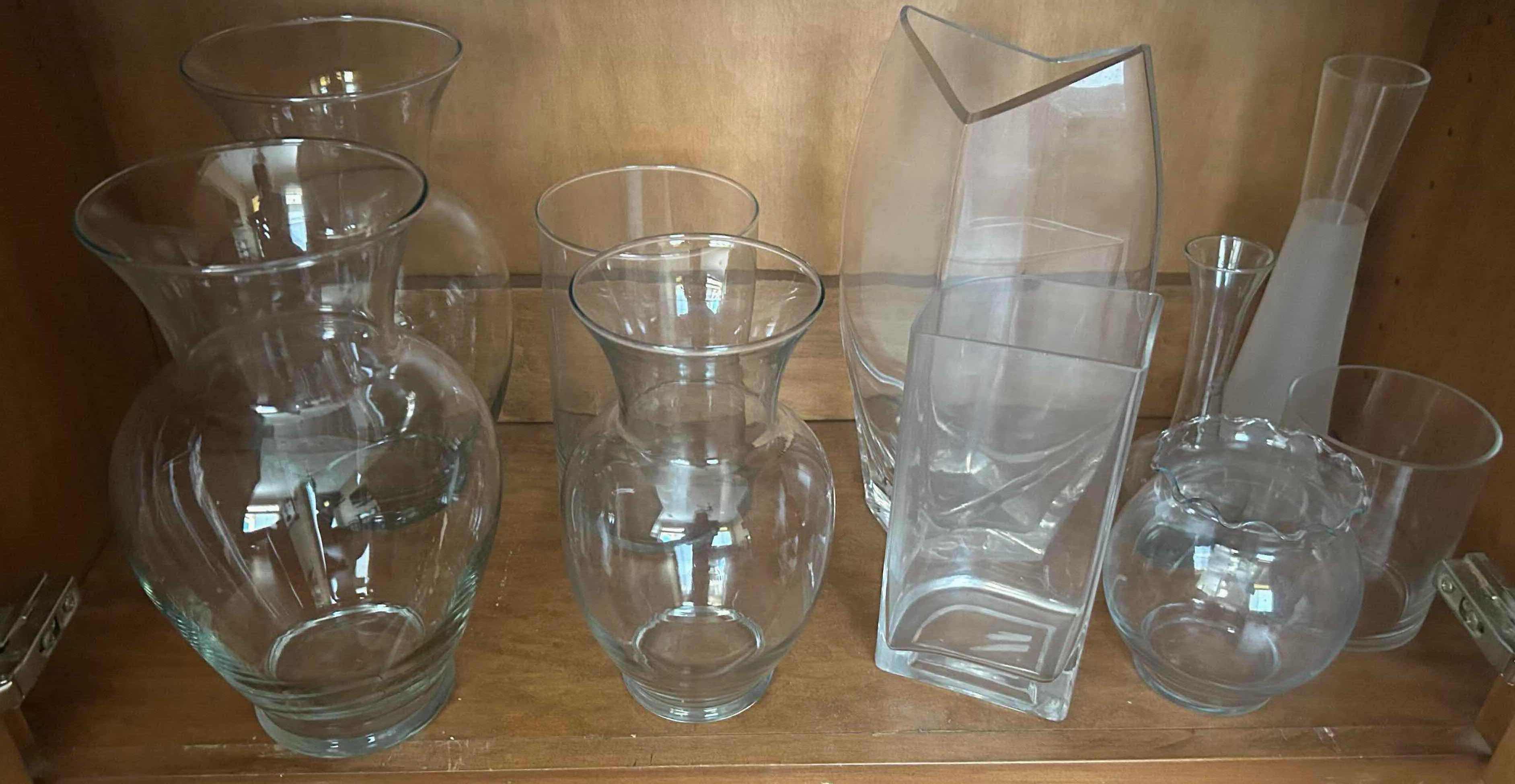 Photo 1 of CONTENTS OF SHELF CLEAR GLASS VASES