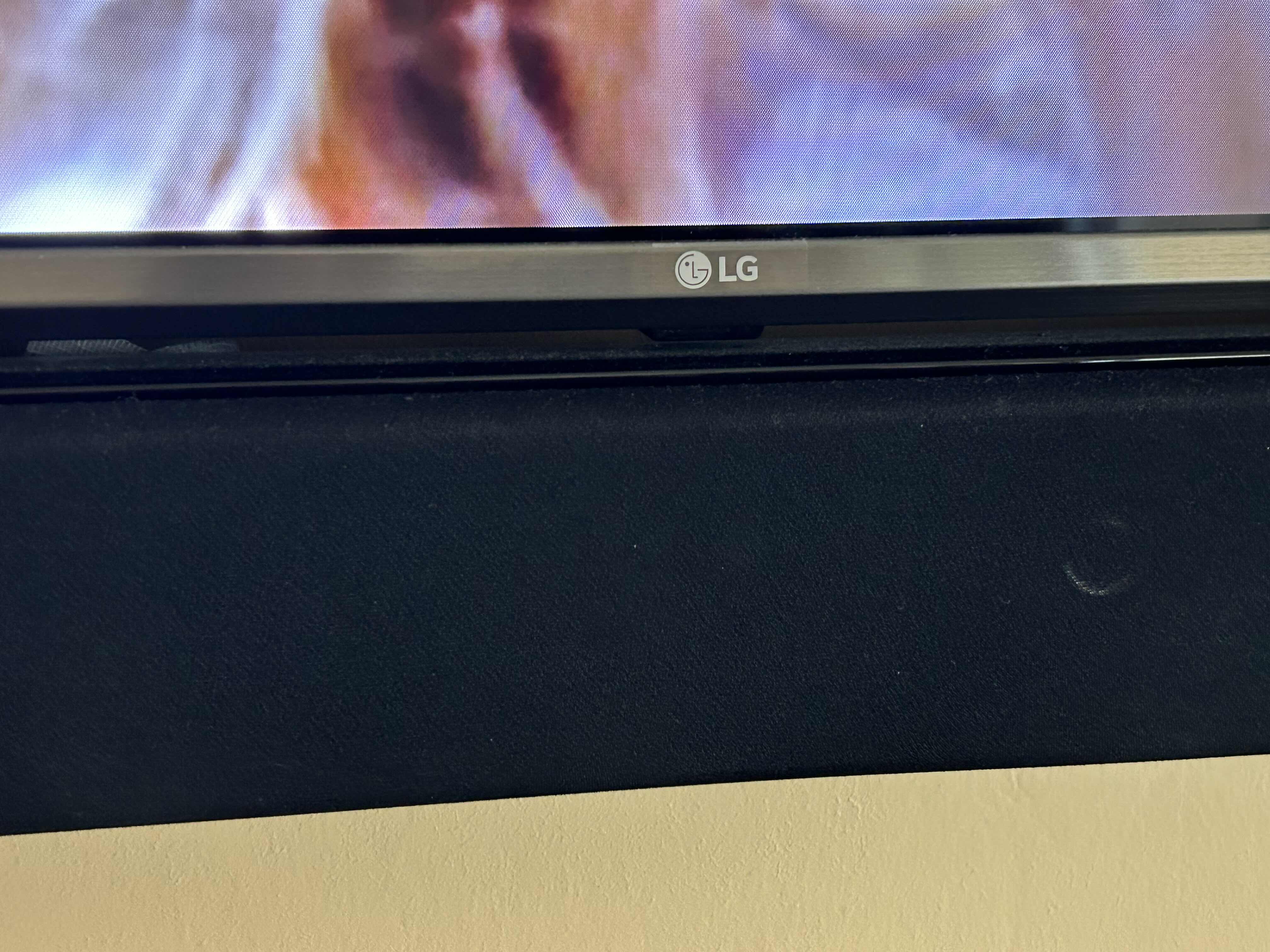 Photo 1 of 75" LG SLIM BEZEL WALL MOUNT TV W SOUND BAR