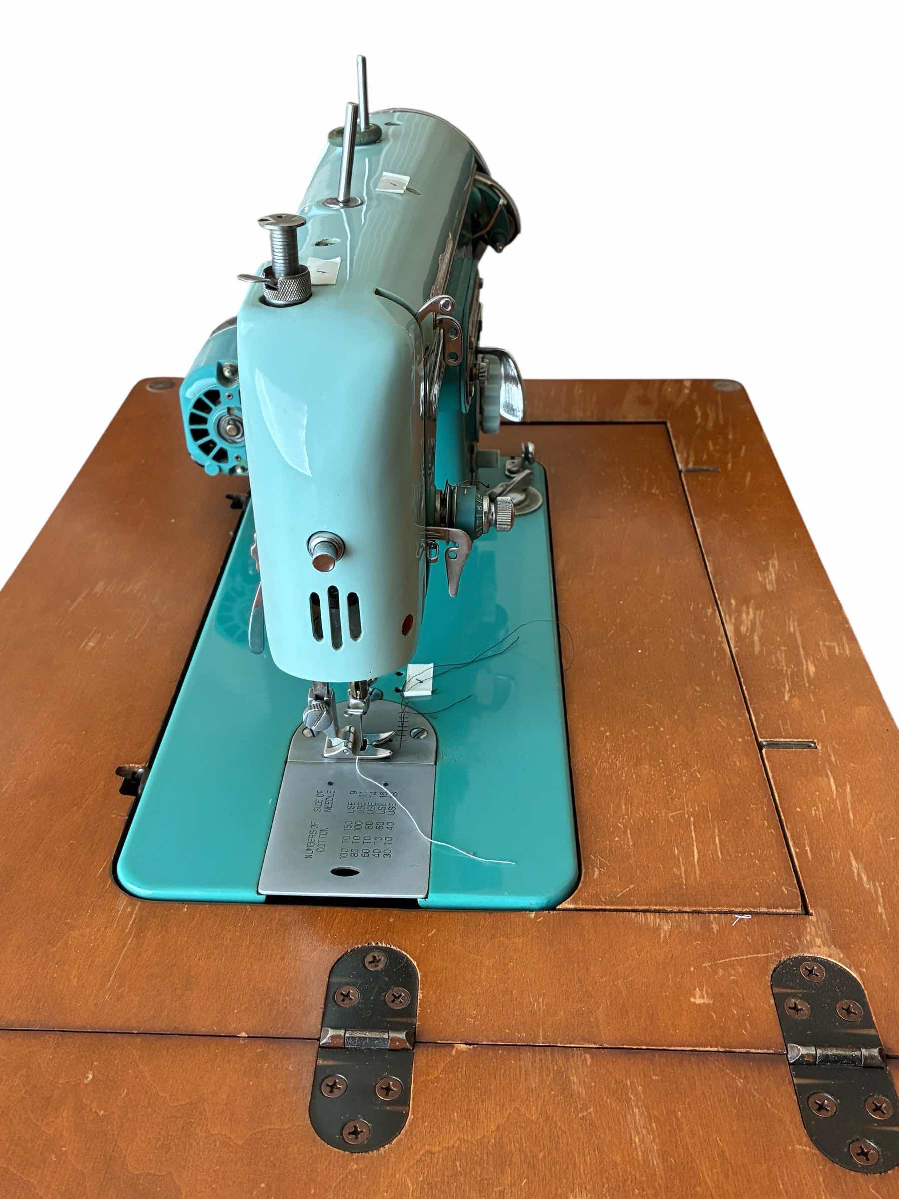 Photo 1 of DRESSMAKER ZIGZAG SEWING MACHINE 900 W WOOD STAND $350