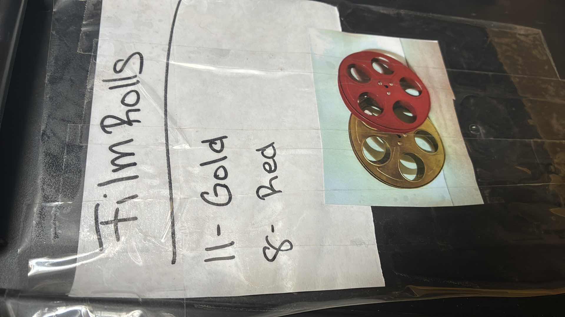 Photo 1 of GOLD & RED DECORATIVE FILM REELS