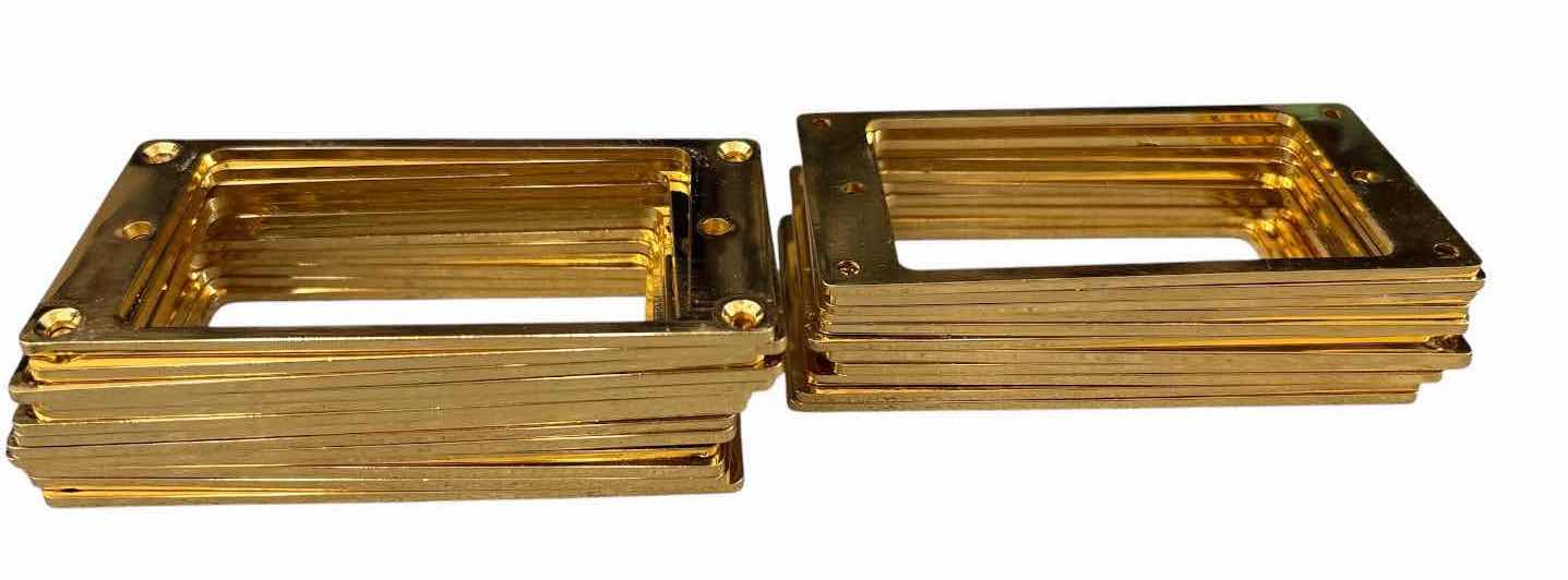 Photo 1 of ASSORTED GOLD-TONE & SMOKED HUMBUCKER GUITAR PICKUP MOUNTING RINGS W/ HARDWARE