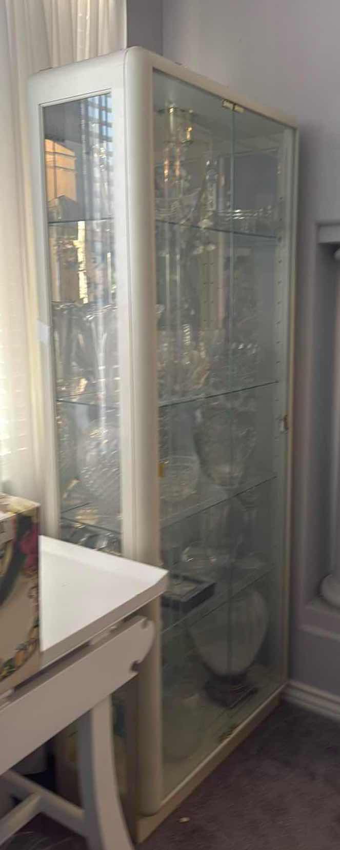 View 3 of LIGHTED BEVELED GLASS CURIO CABINET 29”x14” H78” (CONTENTS NOT INCLUDED)