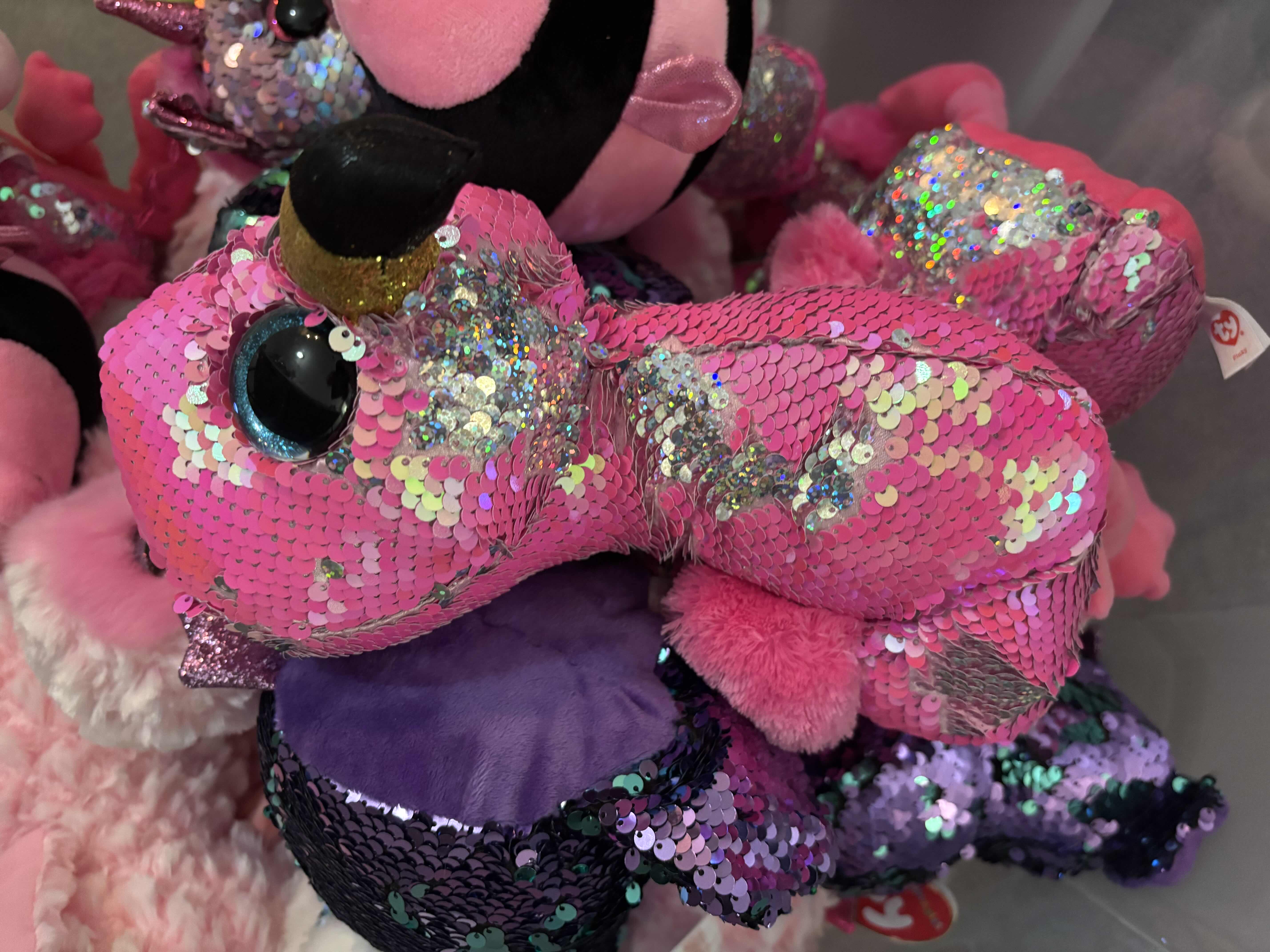 Photo 1 of CONTAINER OF STUFFED ANIMALS, MOST WITH SEQUINS