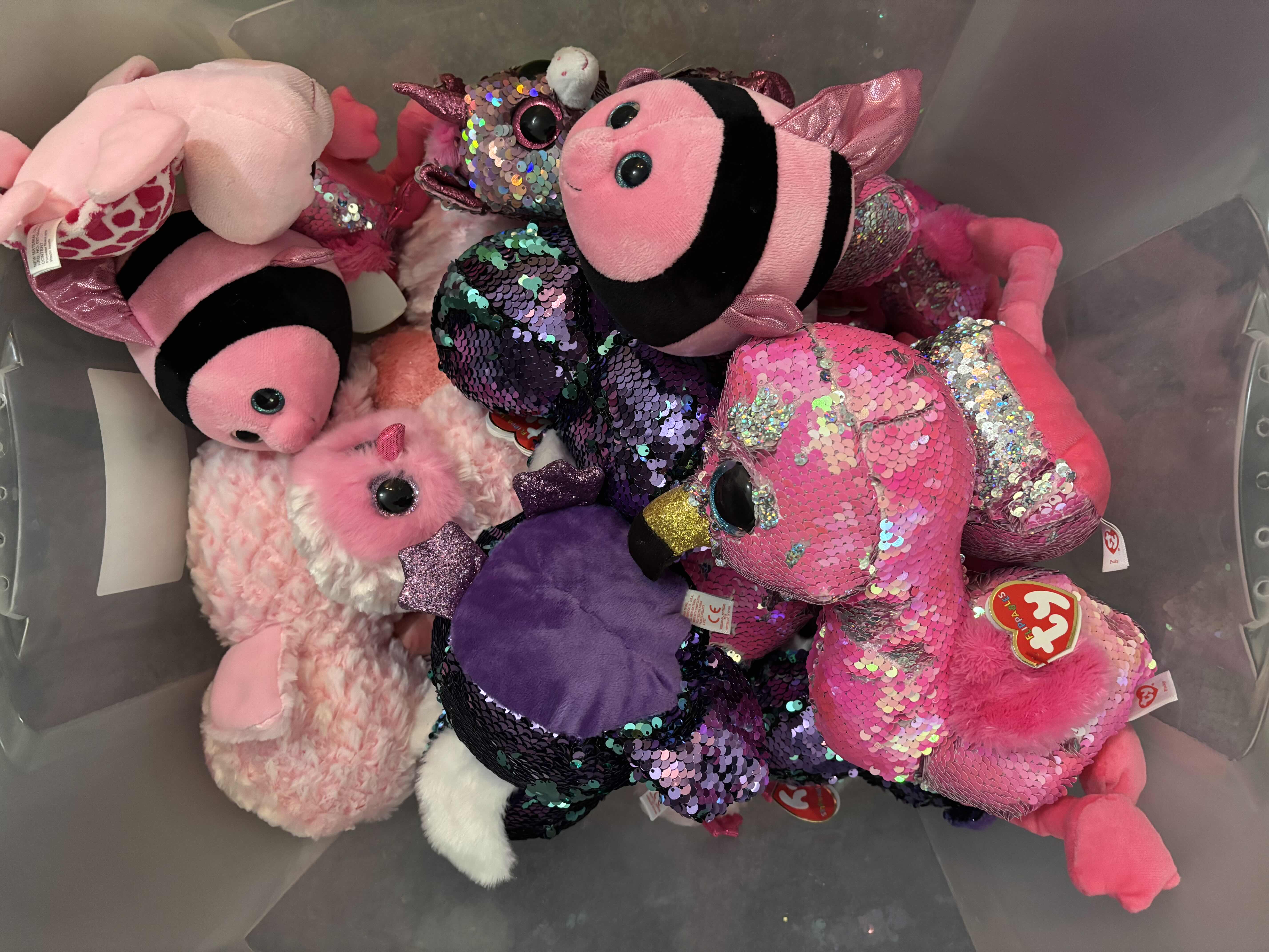 Photo 1 of CONTAINER OF STUFFED ANIMALS, MOST WITH SEQUINS