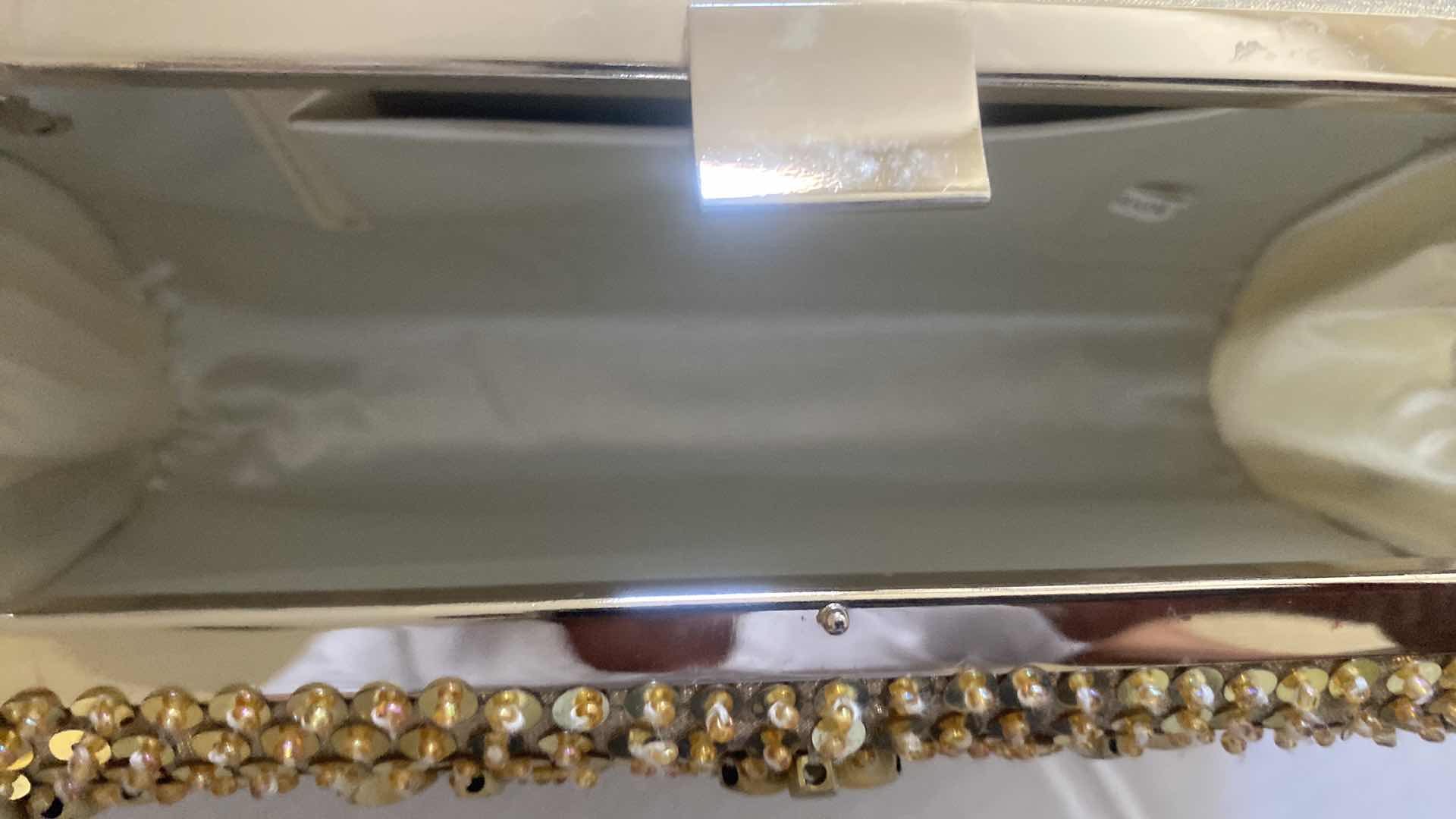 Photo 1 of WOMEN’S GOLD CLUTCH HANDBAG 9” X 5”