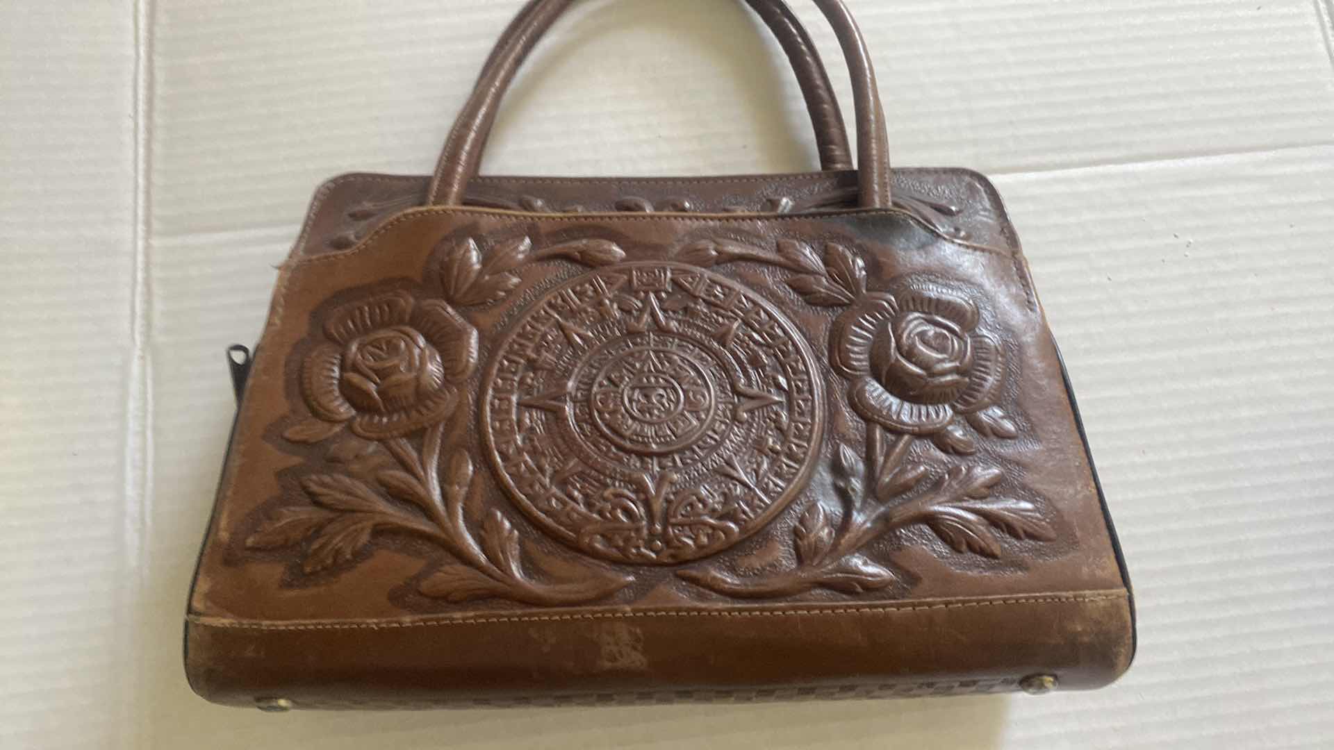 Photo 1 of VINTAGE WOMEN’S MONT-ABUR MEXICAN HAND TOOL LEATHER HANDBAG 12 1/2” X 4” EACH 8 1/2“ EXCLUDING HANDLES