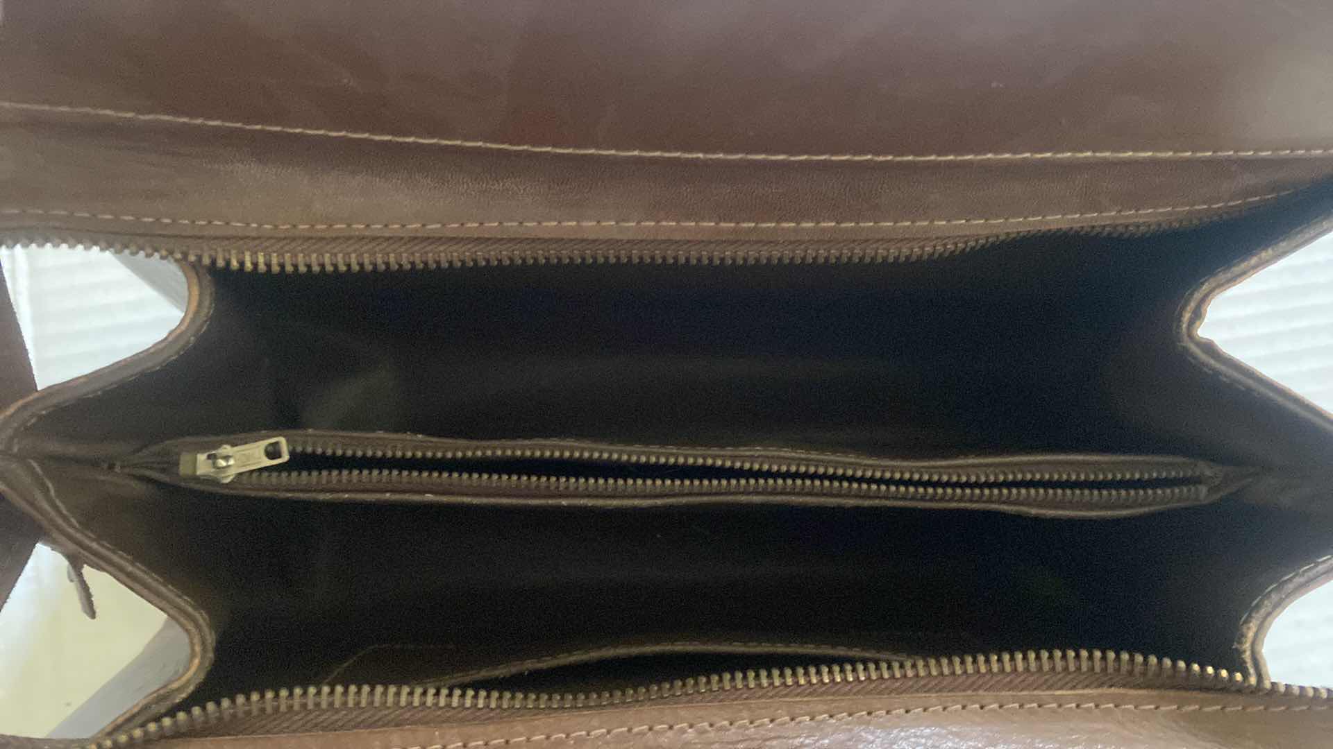 Photo 1 of VINTAGE WOMEN’S MONT-ABUR MEXICAN HAND TOOL LEATHER HANDBAG 12 1/2” X 4” EACH 8 1/2“ EXCLUDING HANDLES