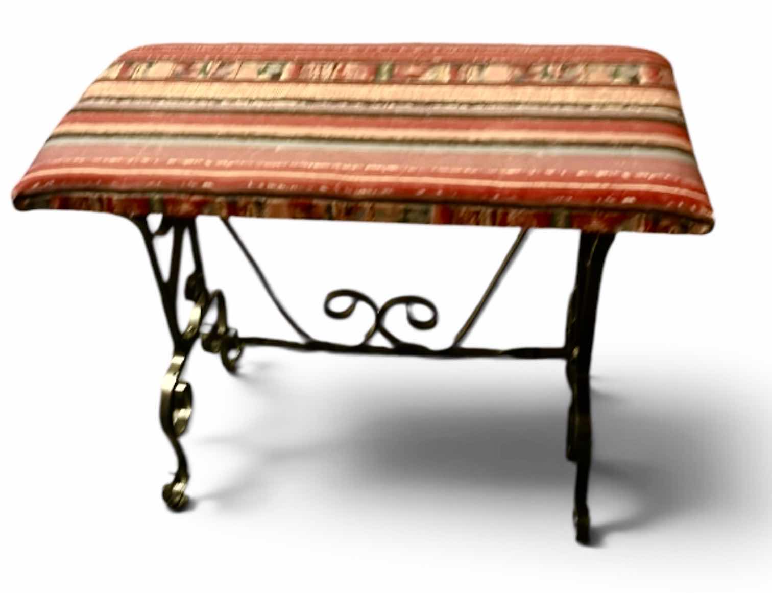 Photo 1 of SPANISH STYLE BENCH FEATURING BLACK SCROLL METAL LEGS AND UPHOLSTERED SEAT . 23” x 11 1/2” x H18 1/2”
