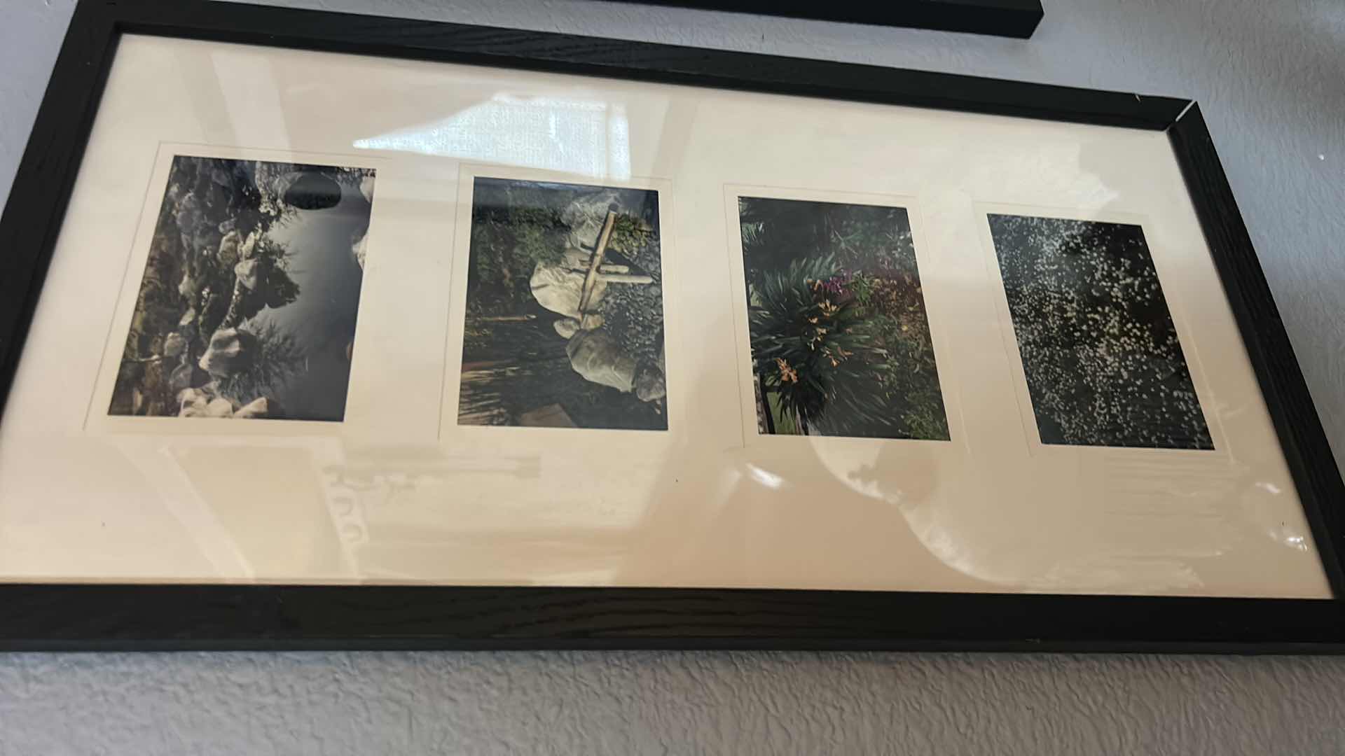 Photo 1 of 2- COLLAGE PICTURE FRAMES, FEATURES A SATIN BLACK FINISH AND A DOUBLE MAT WITH FOUR PHOTO OPENINGS . 11“ x H21“