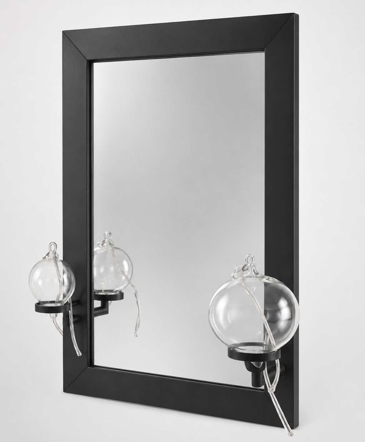 Photo 1 of WALL MIRROR FEATURING A MINIMALIST BLACK FRAME WITH CANDLE HOLDERS AND GLASS BULBS. 13” x H18”
