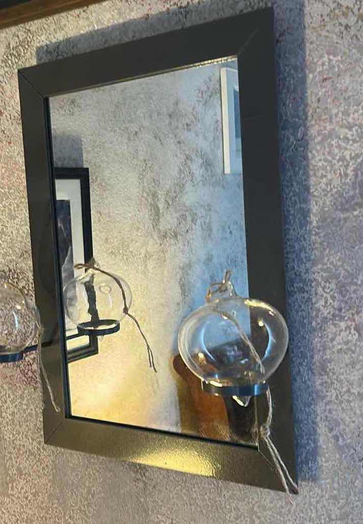Photo 1 of WALL MIRROR FEATURING A MINIMALIST BLACK FRAME WITH CANDLE HOLDERS AND GLASS BULBS. 13” x H18”
