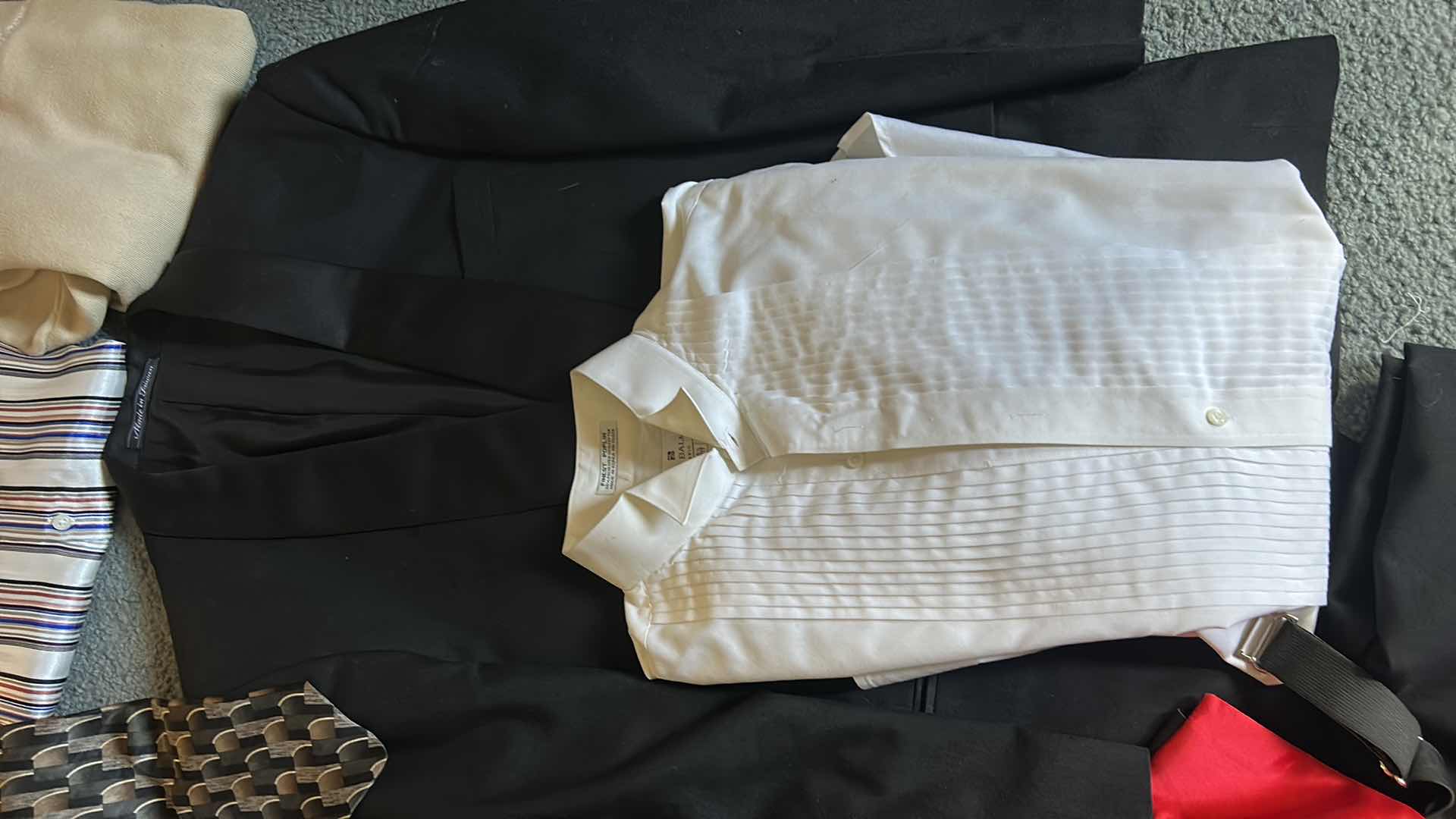 Photo 1 of MEN’S CLOTHING ASSORTMENT – TUX SHIRT, JACKET, PANTS, AND MORE