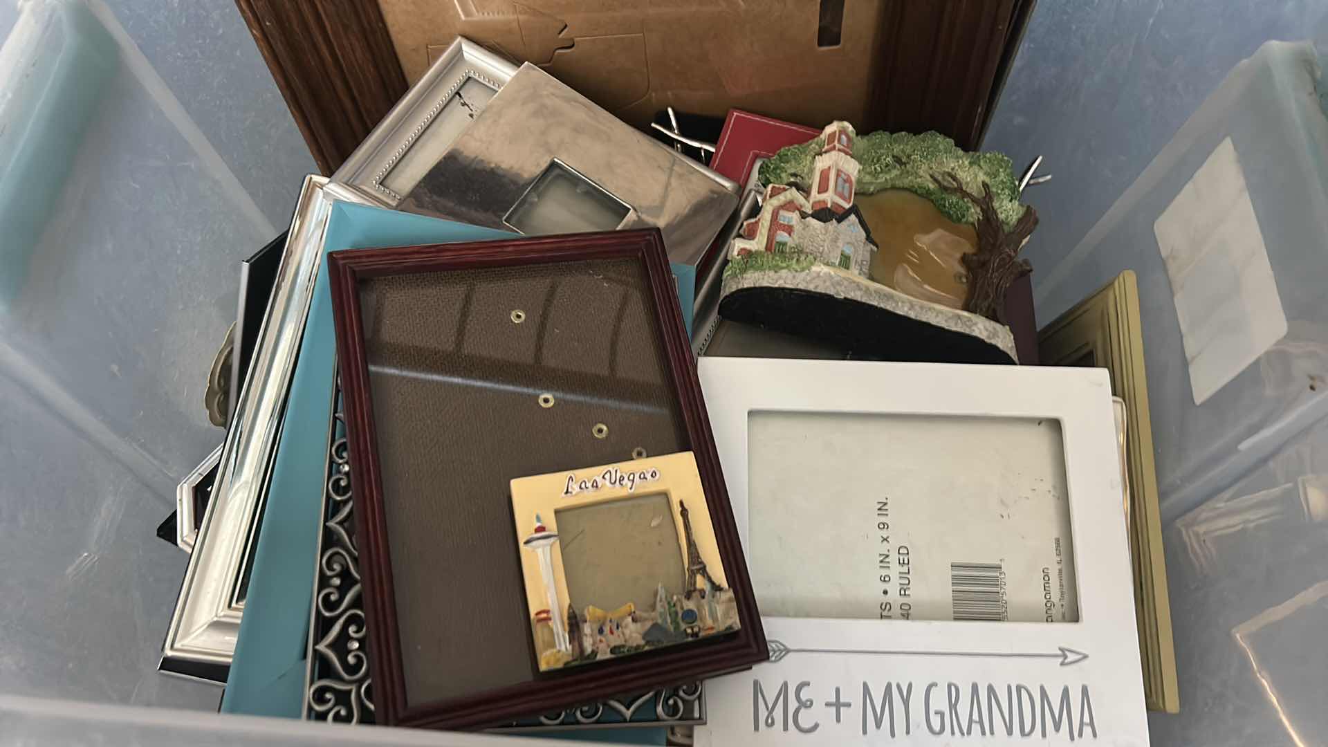 Photo 1 of TOTE FULL OF PICTURE FRAMES