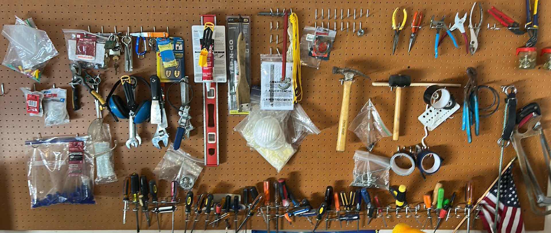 Photo 1 of PEGBOARD WALL FULL OF TOOLS