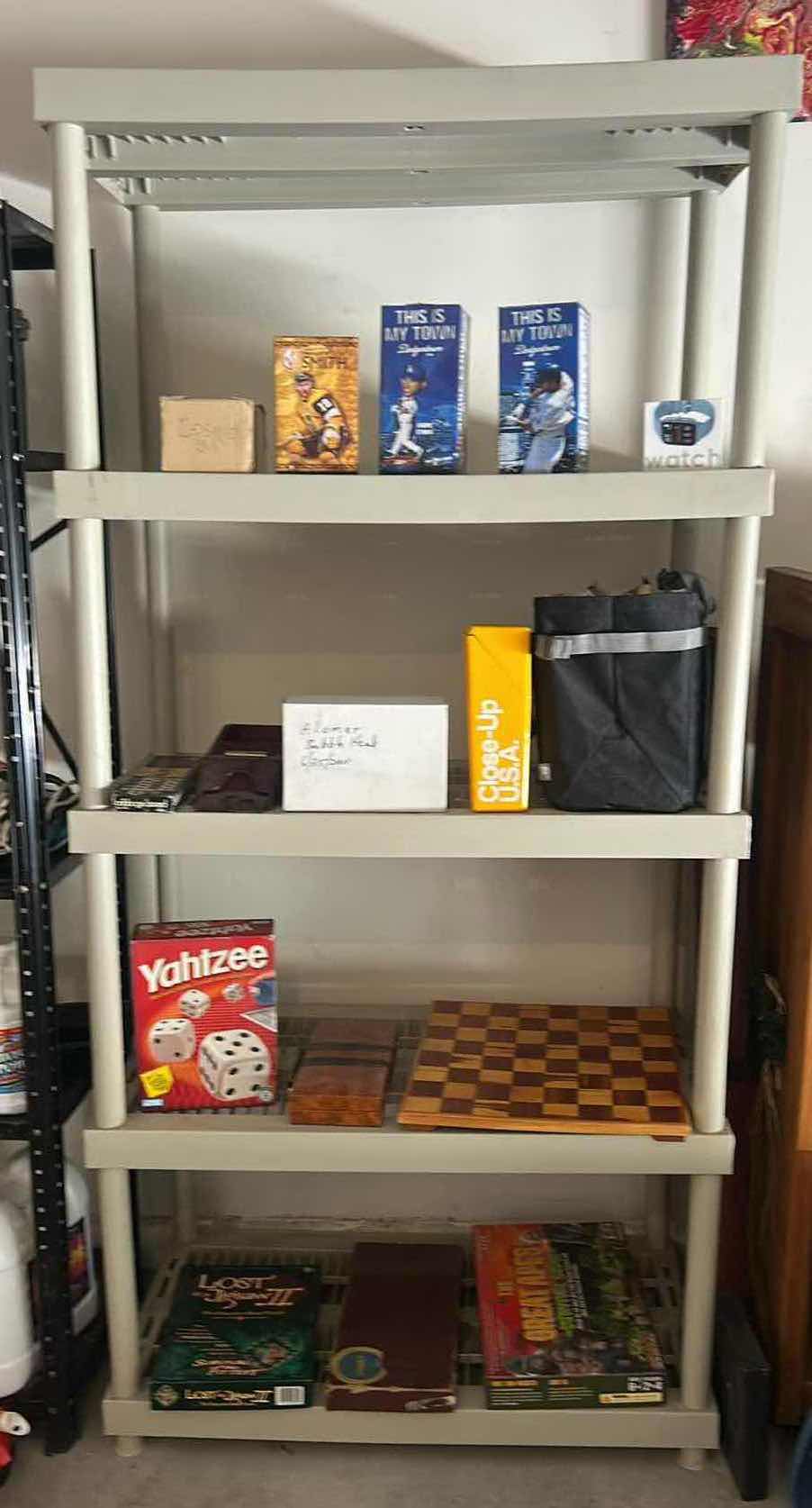 Photo 1 of SHELVING UNIT WITH BOBBLE HEADS AND GAMES