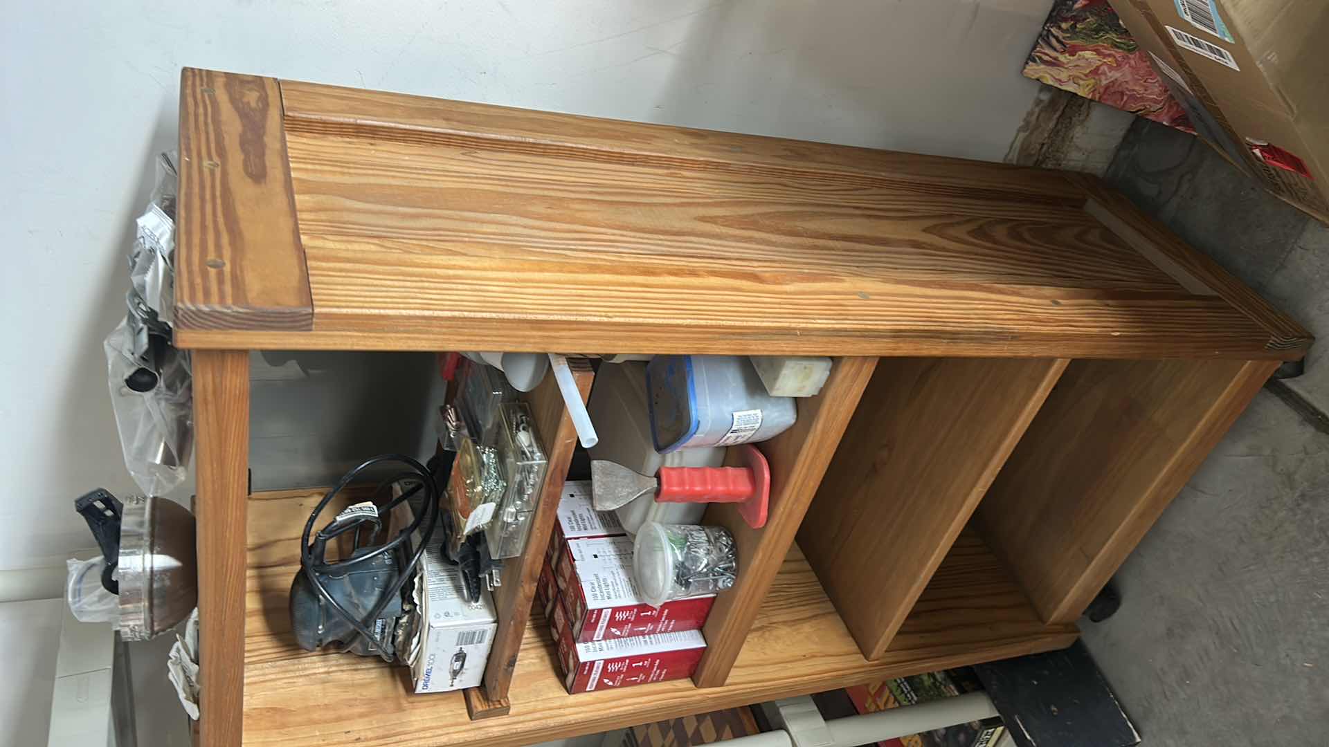 Photo 1 of ROLLING WOOD SHELVING UNIT WITH GARAGE ITEMS