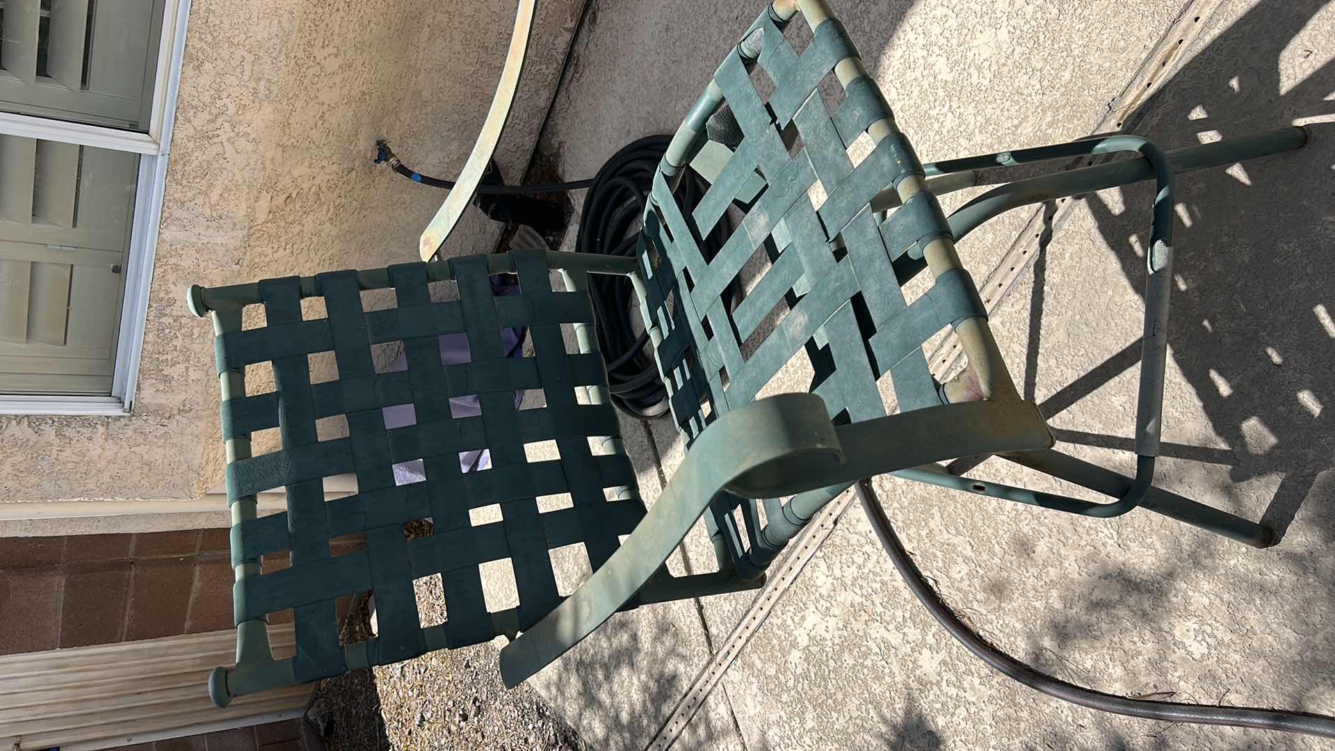 Photo 1 of METAL BAR HEIGHT OUTDOOR TABLE AND TWO CHAIRS WITH GREEN PATINA 28” X 28” X H 27 1/4” SEAT HEIGHT 26” OVERALL HEIGHT 43 1/2”