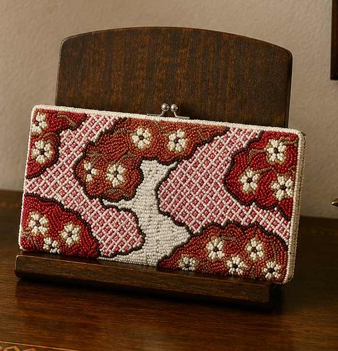 View 1 of VINTAGE JAPANESE SEED BEADED CLUTCH FEATURES AND INTRICATE RED AND WHITE CLOUD AND FLOWER MOTIF
