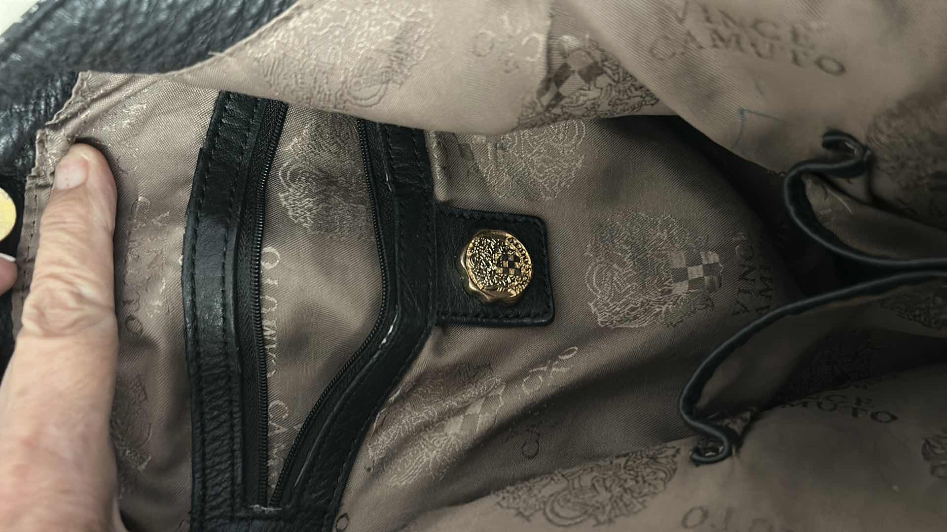 Photo 1 of VINCE CAMUTO, BLACK LEATHER, WHIPSTITCH HOBO BAG.  $100
