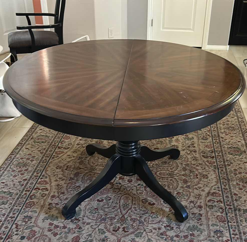 Photo 1 of MAHOGANY ROUND PEDESTAL DINING TABLE WITH DISTINCTIVE STARBURST VENEER PATTERN ON THE TOP AND A BLACK EBONIZED BASE. 4’ x 30” W/ 19”  LEAF