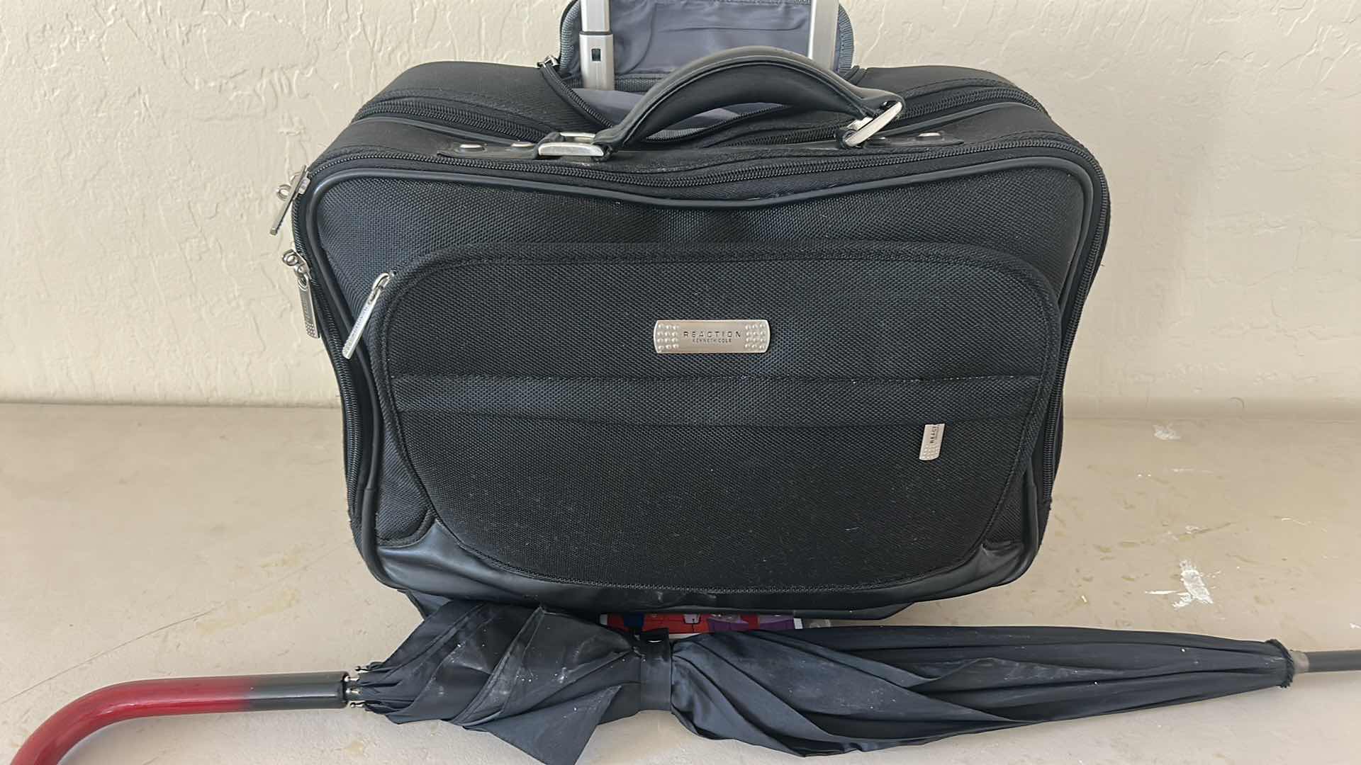 Photo 1 of KENNETH COLE REACTION, LAPTOP, BRIEFCASE WITH A RETRACTABLE HANDLE AND WHEELS AND UMBRELLA