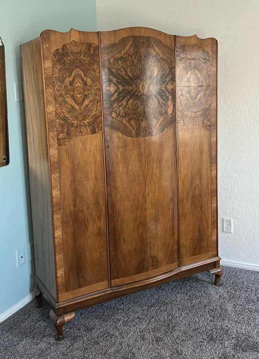 Photo 1 of 1930s ART DECO TRIPLE WARDROBE FEATURES A BOOK MATCHED WALNUT VENEER WITH A CLASSIC ARCHED “CLOUD”TOP SILHOUETTE AND CABRIOLE FEET. $1500 - $2500