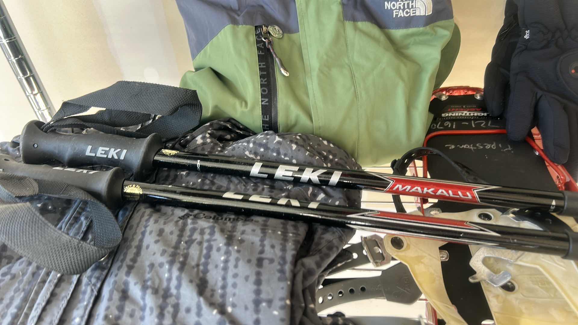 Photo 1 of SNOW SHOES, POLES AND GLOVES, WINTER GARMENTS, AND MORE (SIZE 10 SHOES)