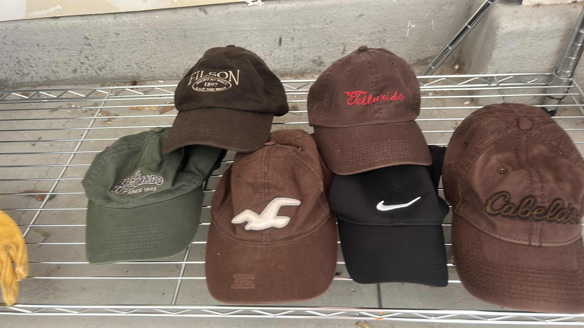 Photo 1 of BASEBALL HATS AND GLOVES
