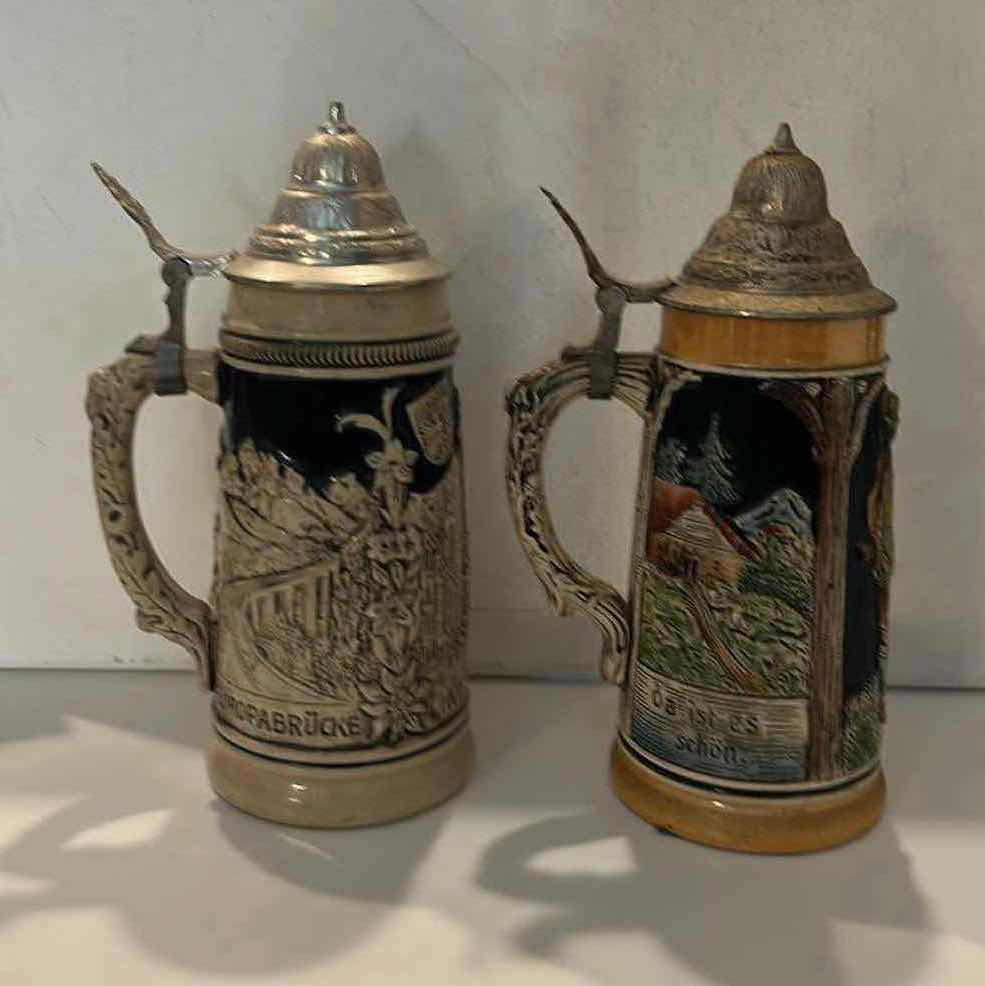 Photo 1 of 2 GERMAN & W GERMAN CERAMIC BEER STEINS