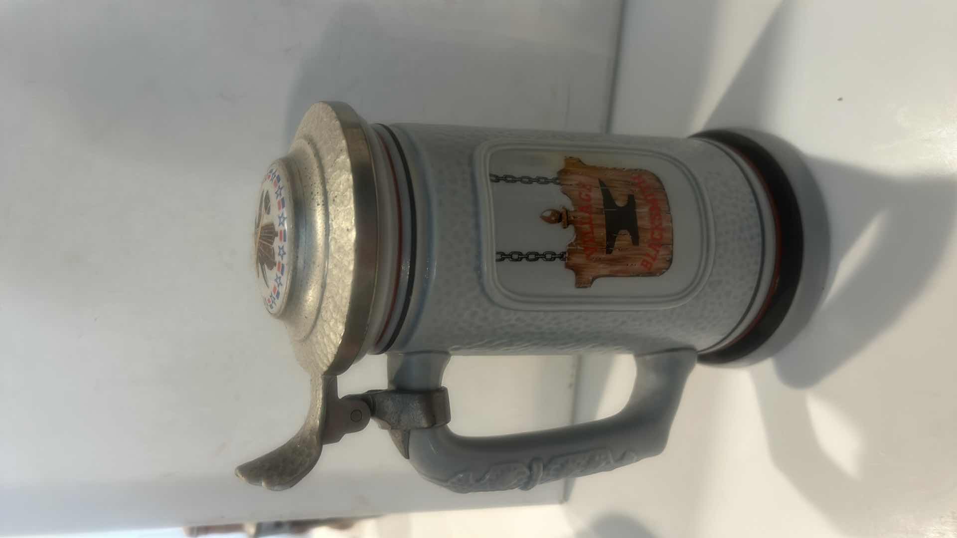 Photo 1 of AVON CERAMIC BEER STEIN TITLED "THE BLACKSMITH"