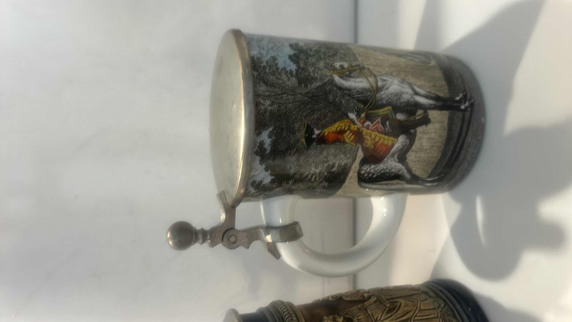 Photo 1 of 2  VINTAGE WEST GERMAN CERAMIC BEER STEINS ( TALLEST H7.5”)