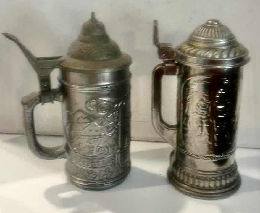 Photo 1 of 2 METALLIC RELIEF BEER STEINS 8”