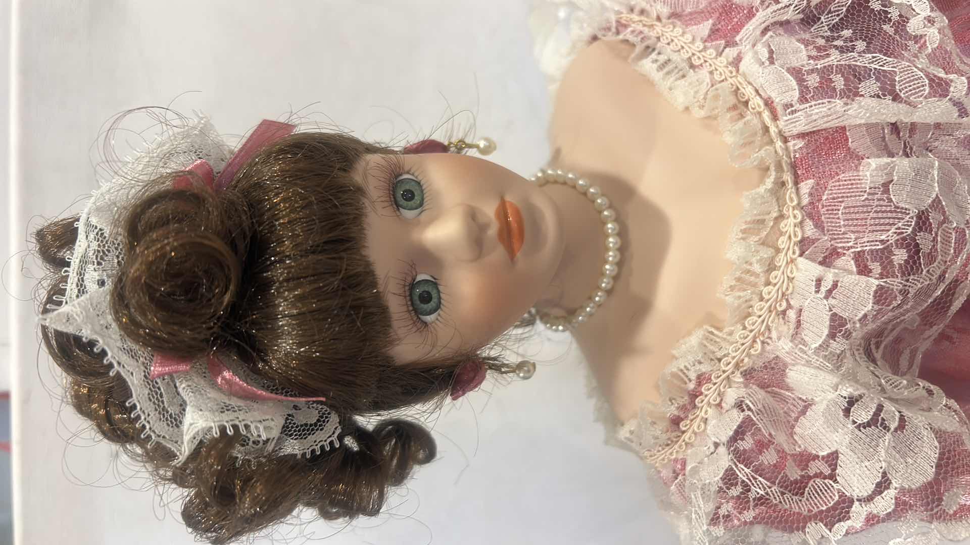 Photo 1 of PORCELAIN COLLECTIBLE DOLL H19”