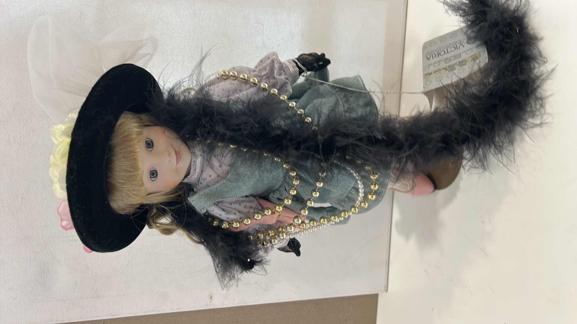 Photo 1 of VINTAGE "LITTLE GIRL PLAYING DRESS UP" MUSICAL PORCELAIN DOLL (NAMED "CASEY"), H14” $50