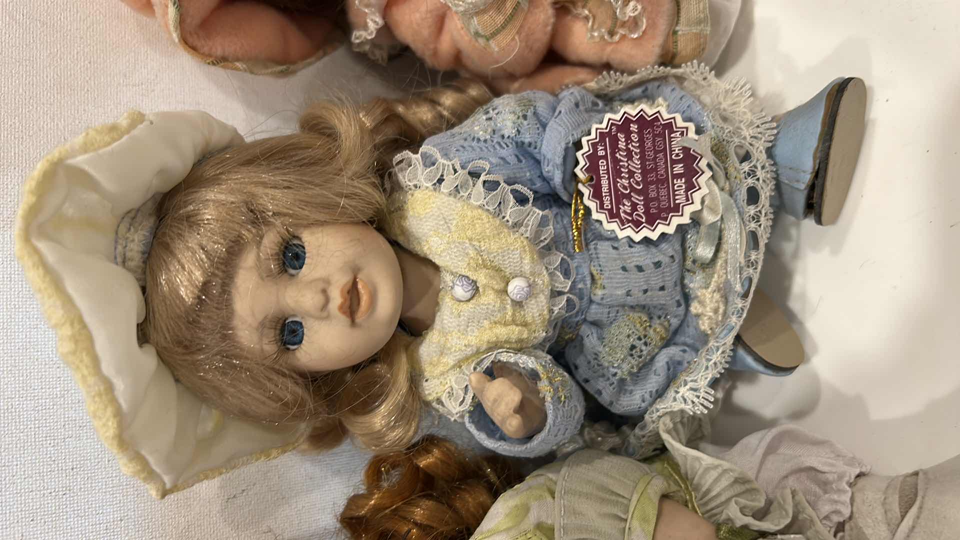 Photo 1 of 3 PORCELAIN DOLLS H8”