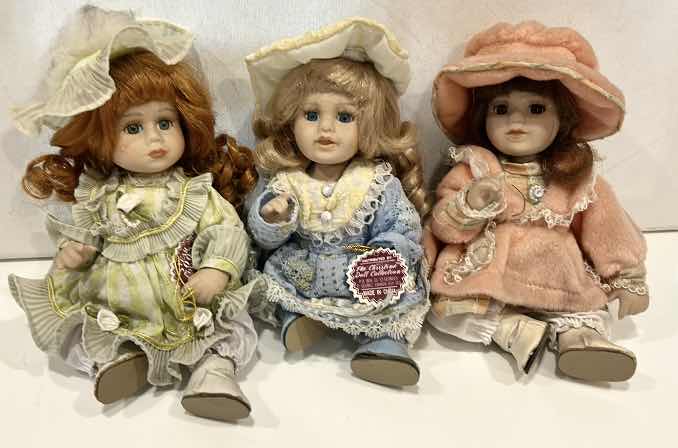 Photo 1 of 3 PORCELAIN DOLLS H8”