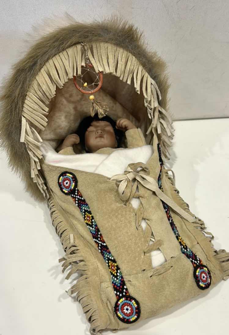 Photo 1 of VINTAGE NATIVE AMERICAN-STYLE PORCELAIN PAPOOSE BABY DOLL 
12” x H7” $60