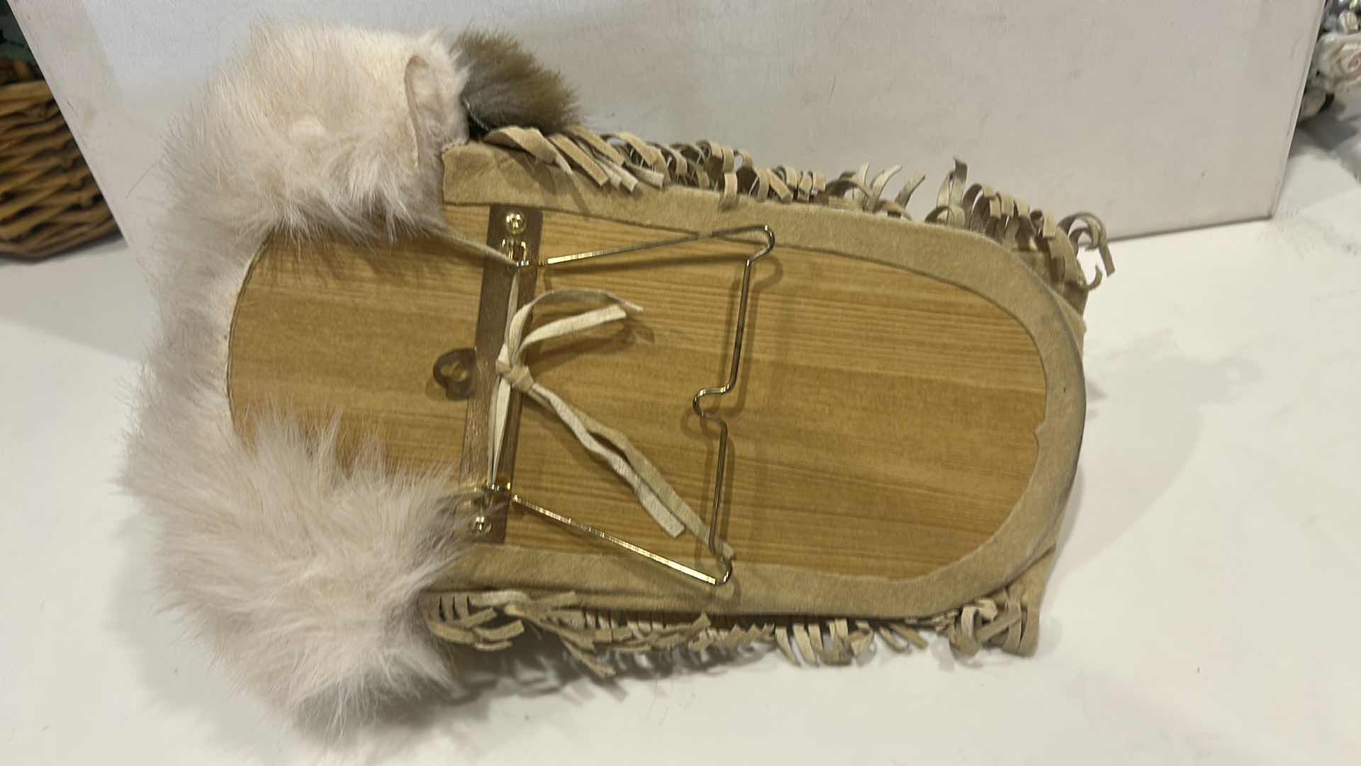 Photo 1 of VINTAGE NATIVE AMERICAN-STYLE PORCELAIN PAPOOSE BABY DOLL 
12” x H7” $60