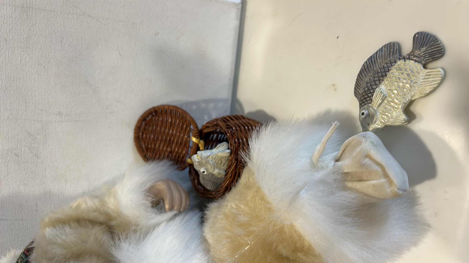 Photo 1 of VINTAGE PORCELAIN DOLL, TRADITIONAL INUIT WINTER PARKA W FISHING ROD & BASKET W FISH $60