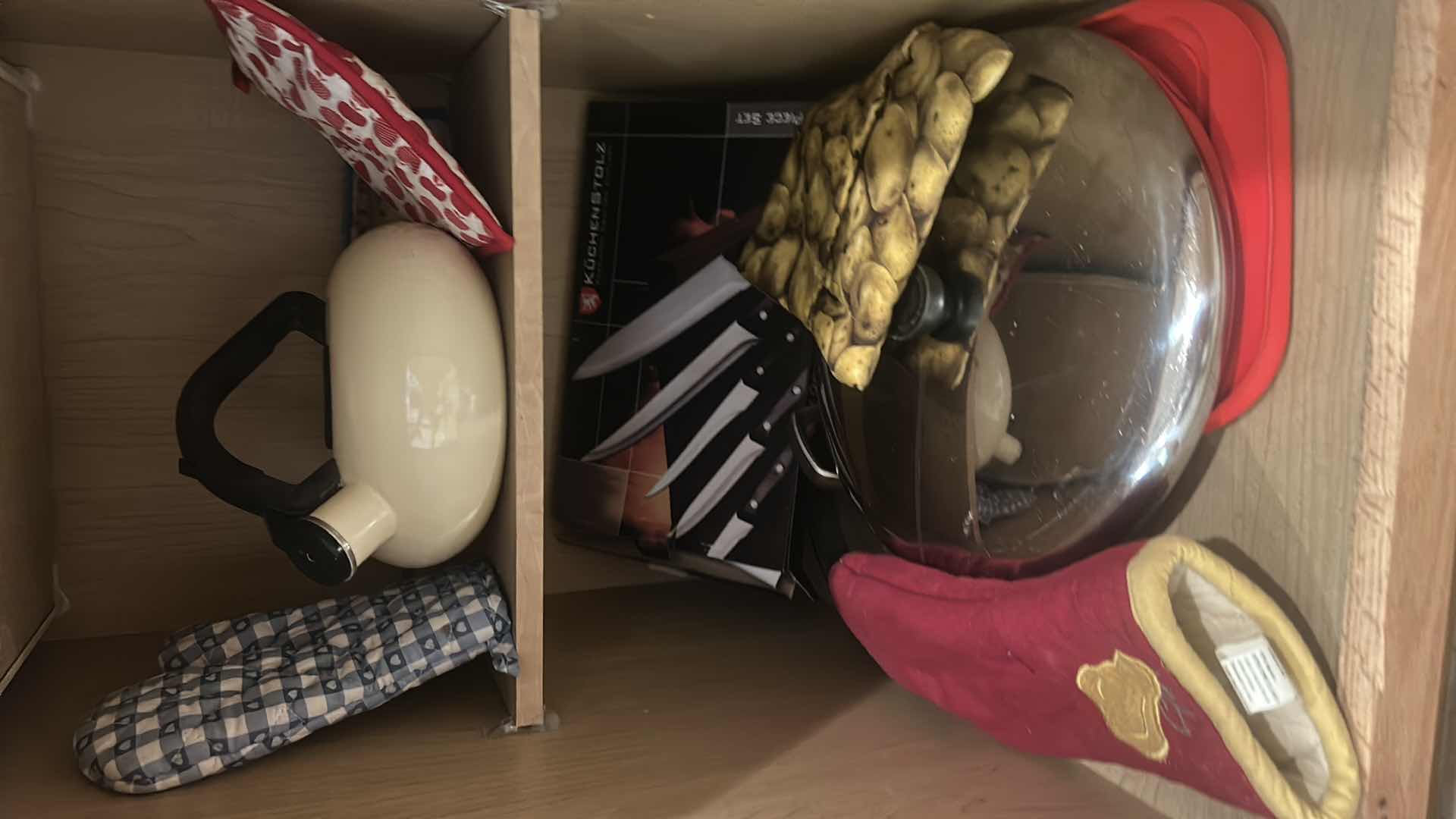 Photo 1 of CONTENTS OF CABINET IN KITCHEN