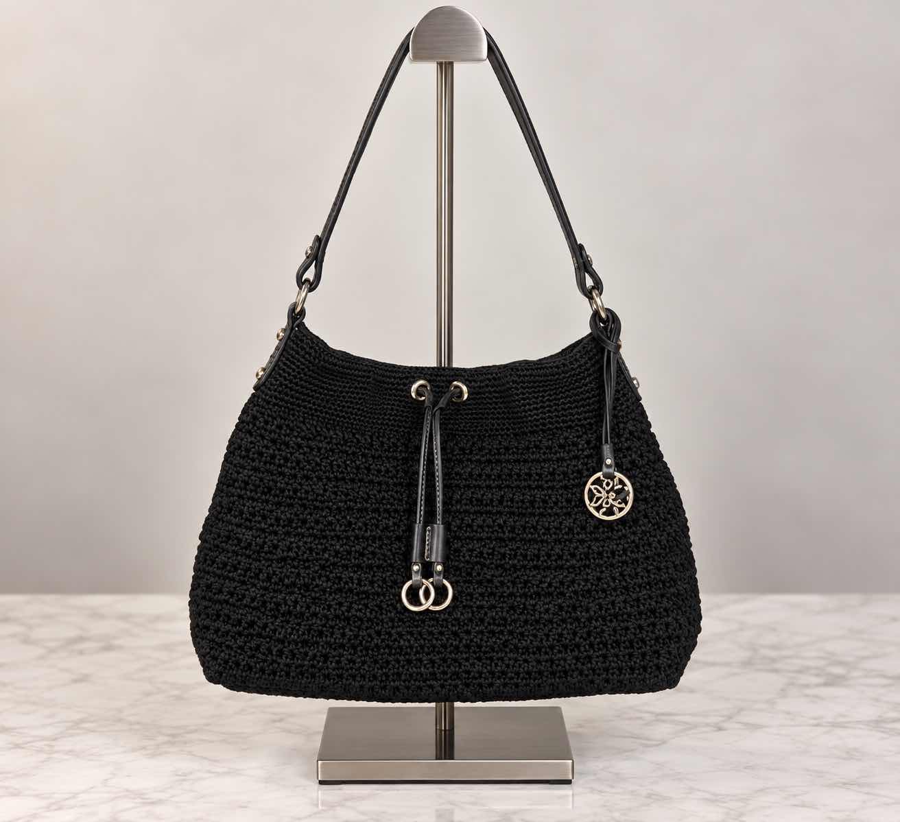 Photo 1 of THE SAK WOVEN SHOULDER BAG