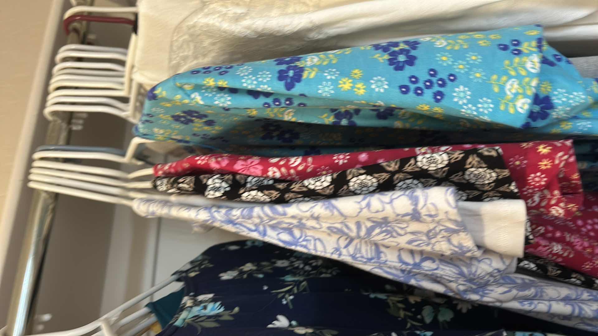 Photo 1 of WOMEN’S CLOTHING ASSORTMENT SIZE LARGE