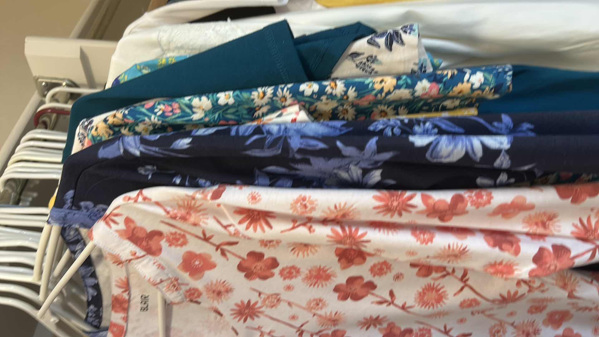 Photo 1 of WOMEN’S CLOTHING ASSORTMENT SIZE LARGE